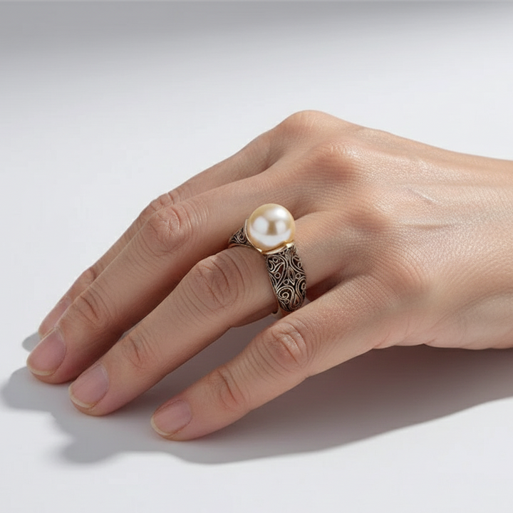 Bague en or avec perle