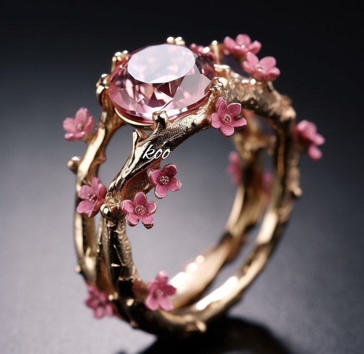 Bague en or avec cristal rose et petites fleurs